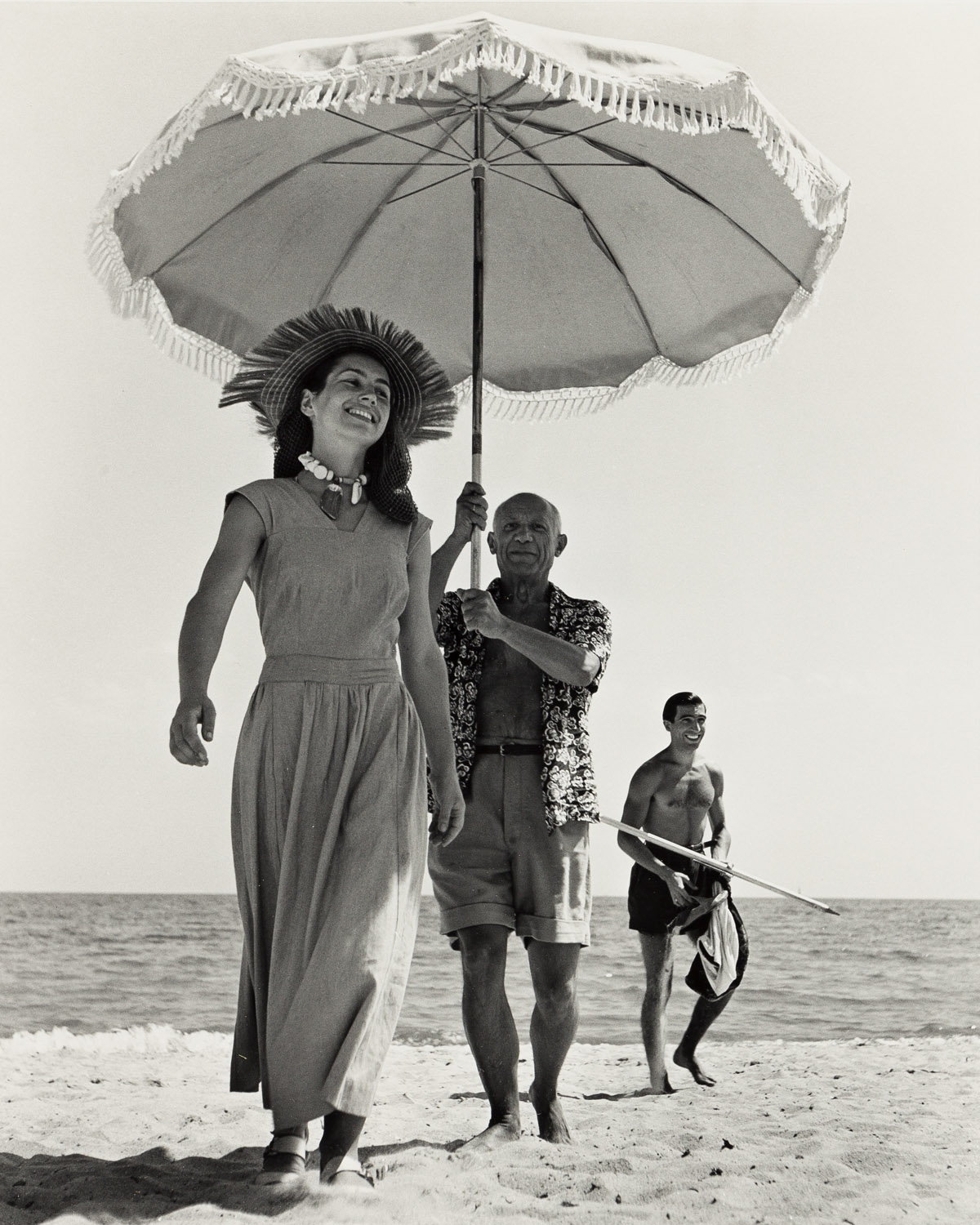 (ROBERT CAPA) (1913-1954) Pablo Picasso and Francoise Gilot, Golfe-Juan, France.